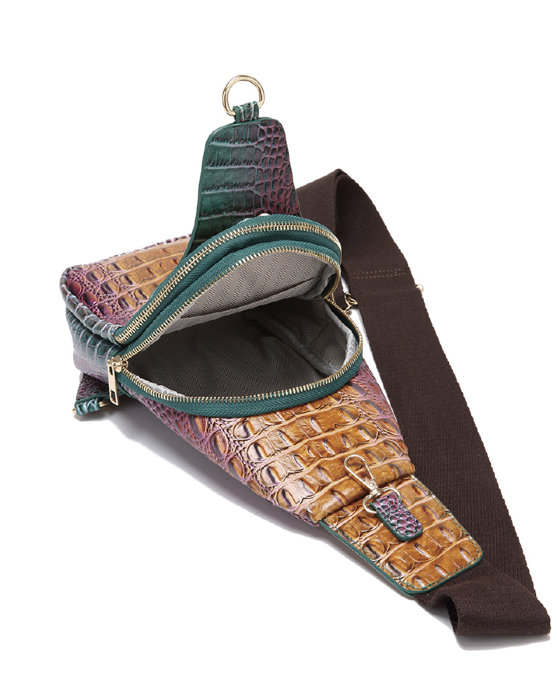Croc-embossed sling bag open, angled front view