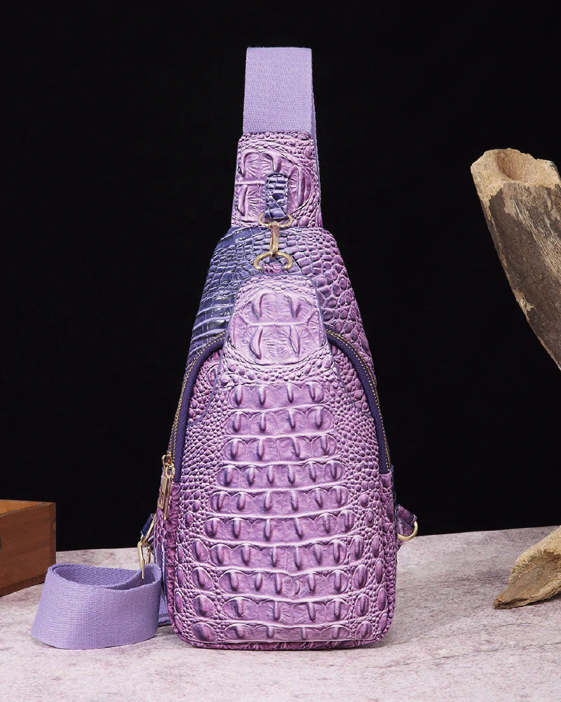 Croc-embossed sling bag with front zip pocket