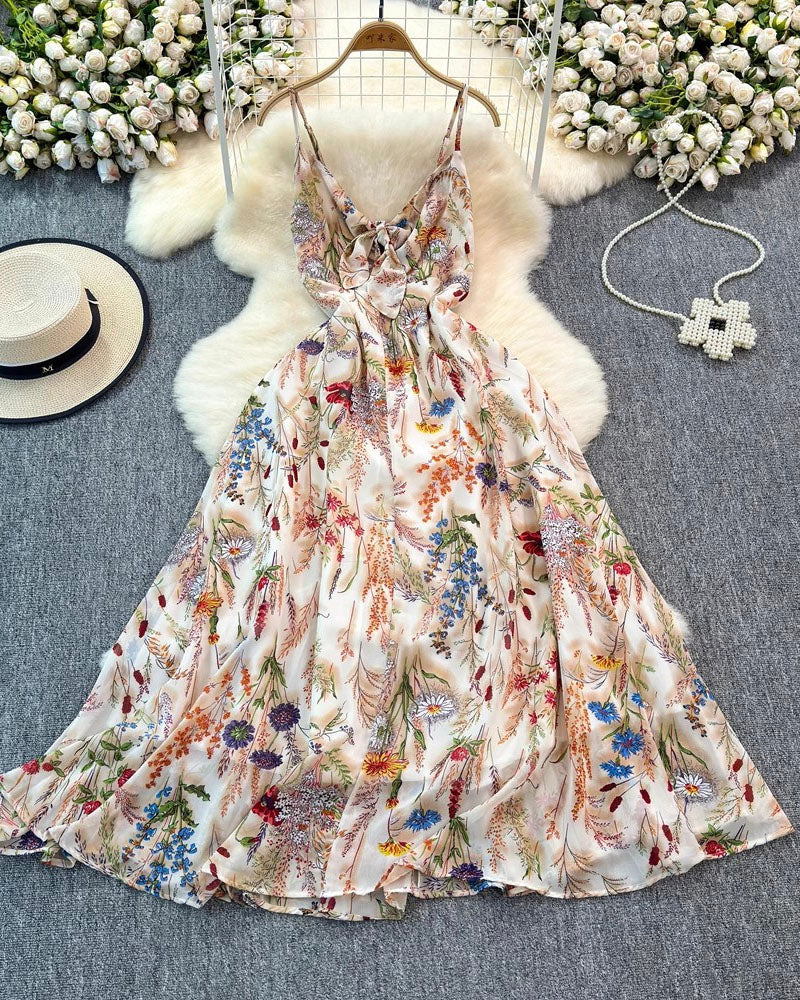 Floral adjustable-strap maxi dress laid flat, full view