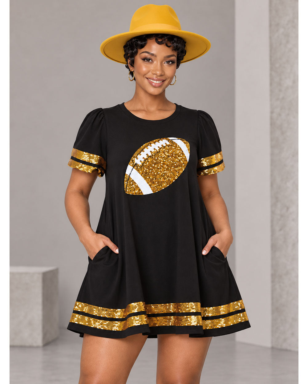Black sequin football tunic dress, front view