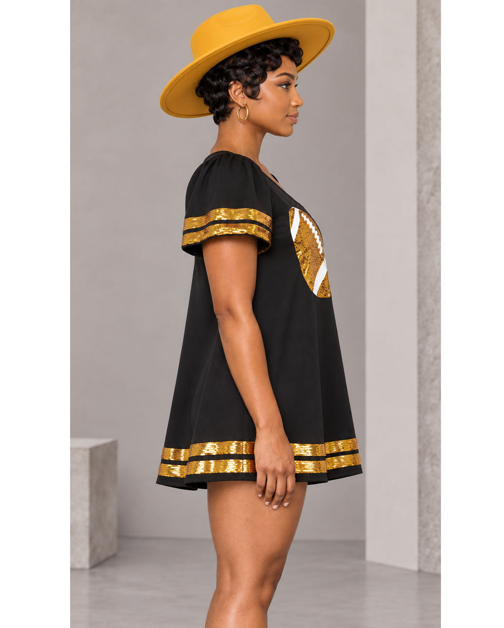 Black sequin football tunic dress, side view