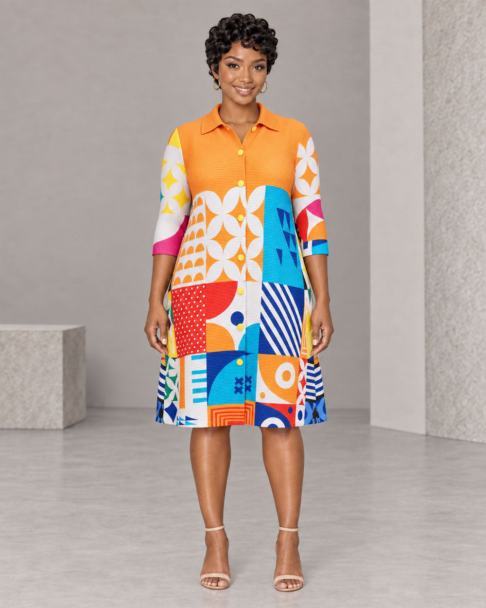 Orange multicolor geometric pleated midi dress, front view