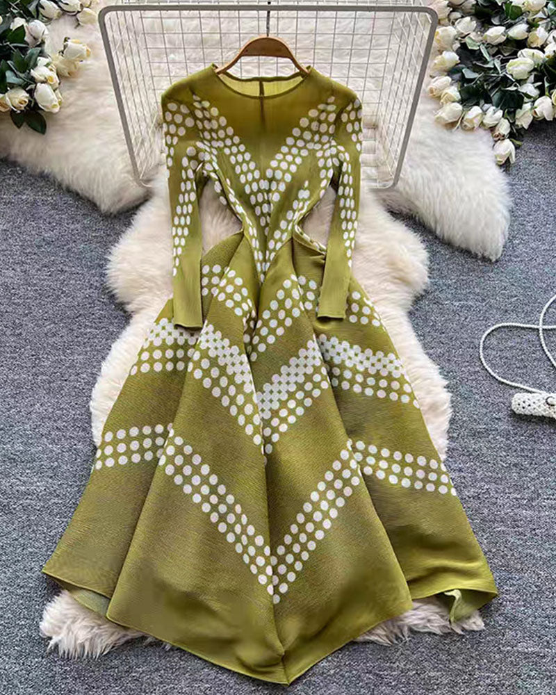 Olive green zigzag pleated maxi dress displayed on hanger