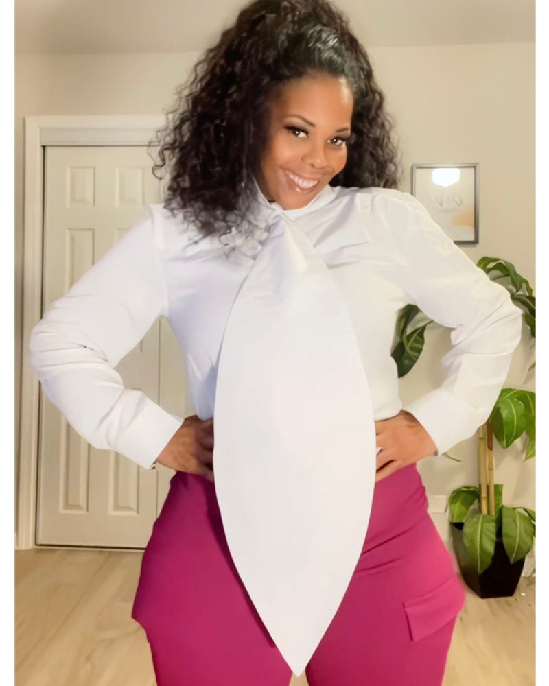 White oversized tie-front shirt styled with hot pink pants