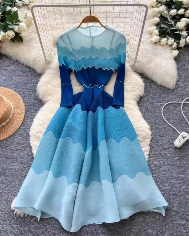 Blue gradient pearl-detail midi dress displayed on hanger