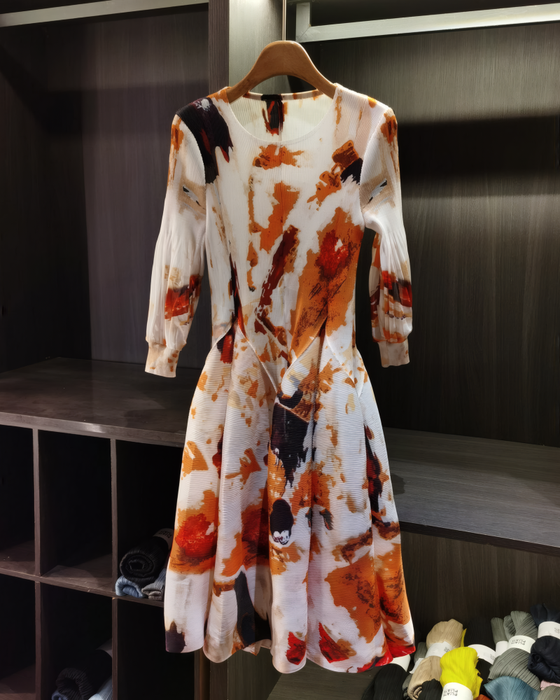 White and brown floral-print bouncy midi dress displayed on hanger