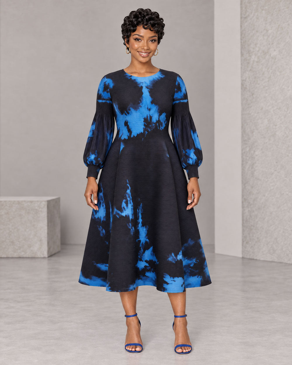 Black and blue abstract-print bouncy midi dress, front view