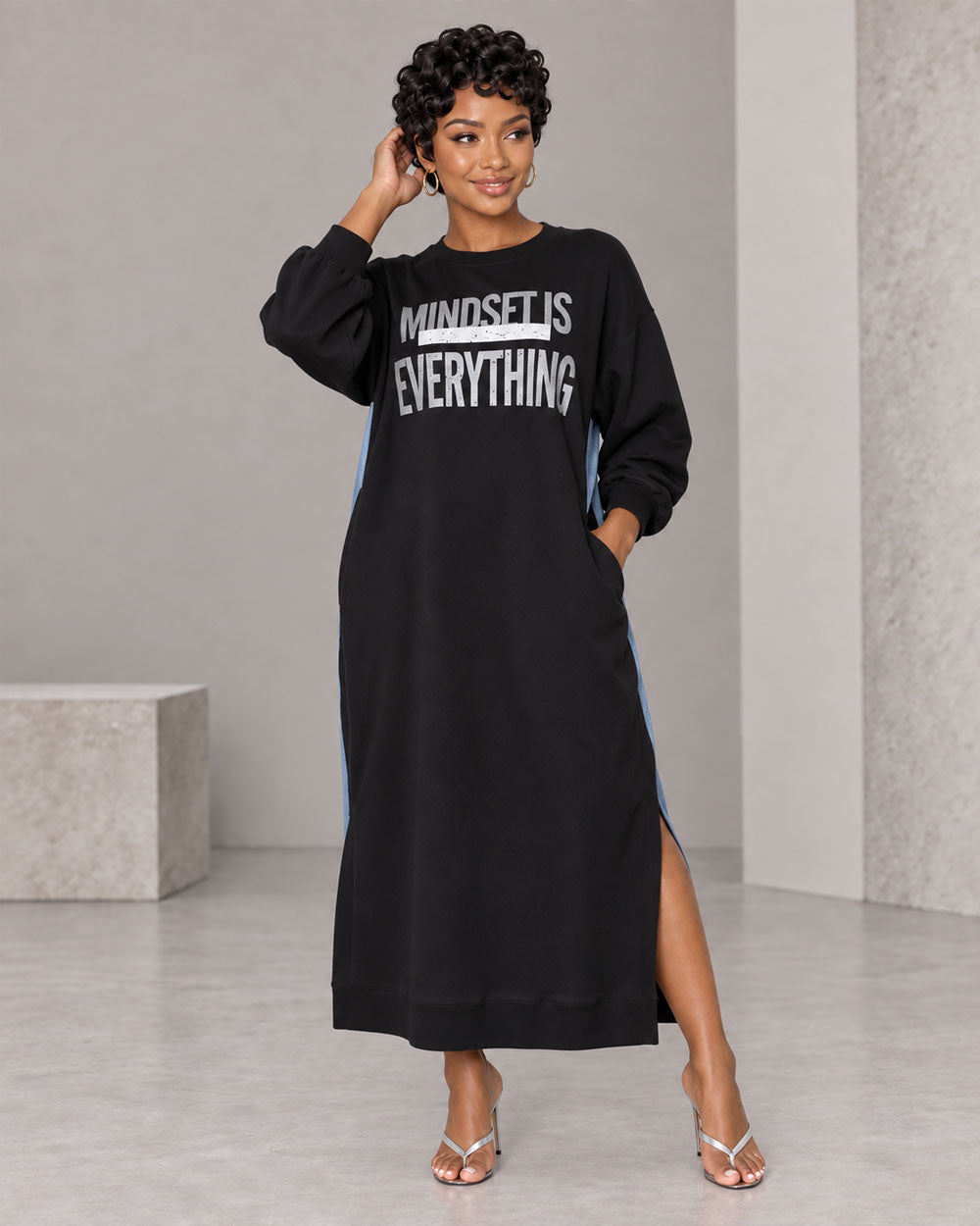 Black sweatshirt and denim maxi dress, front pose