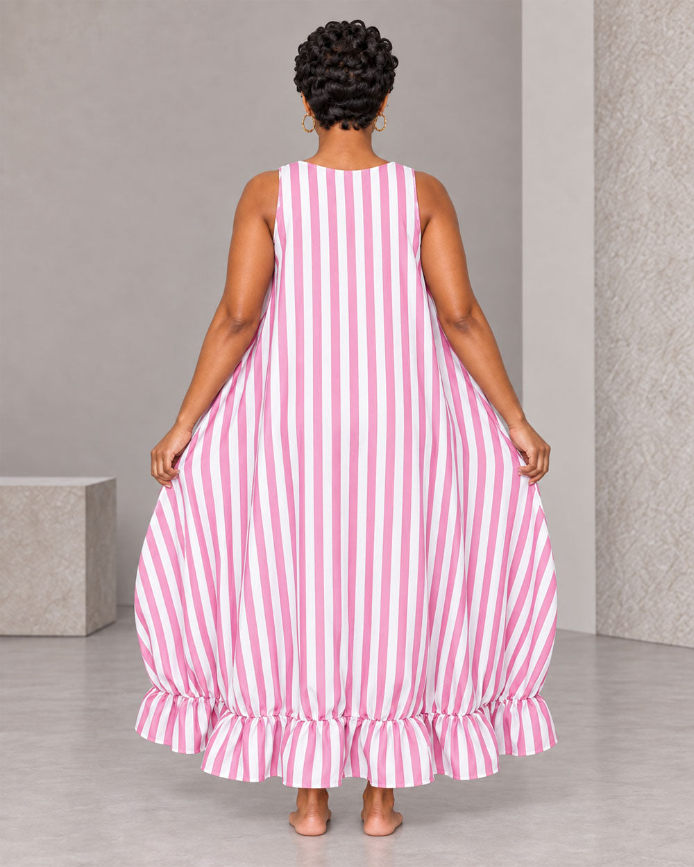 Pink striped ruffle maxi dress, back view
