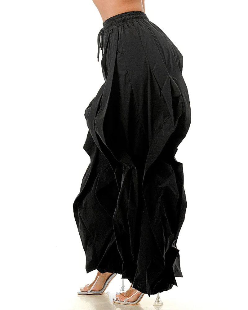 Black layered ruffle wide-leg jogger pants, side view