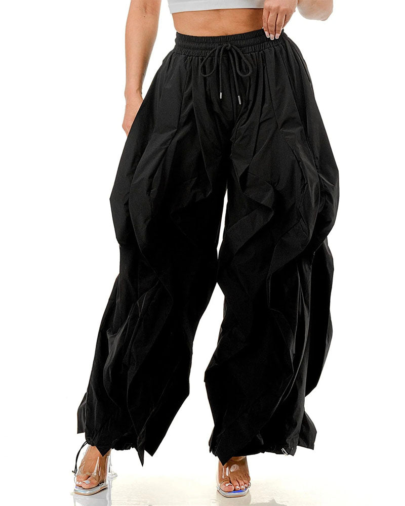 Black layered ruffle wide-leg jogger pants, front view