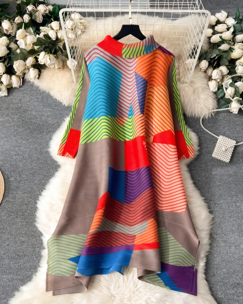 Coral multicolor color-block pleated midi dress displayed on hanger